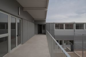 CompactHabit primary school escola primaria CEIP modular concrete formigó acer eMii-CS nou de gaià